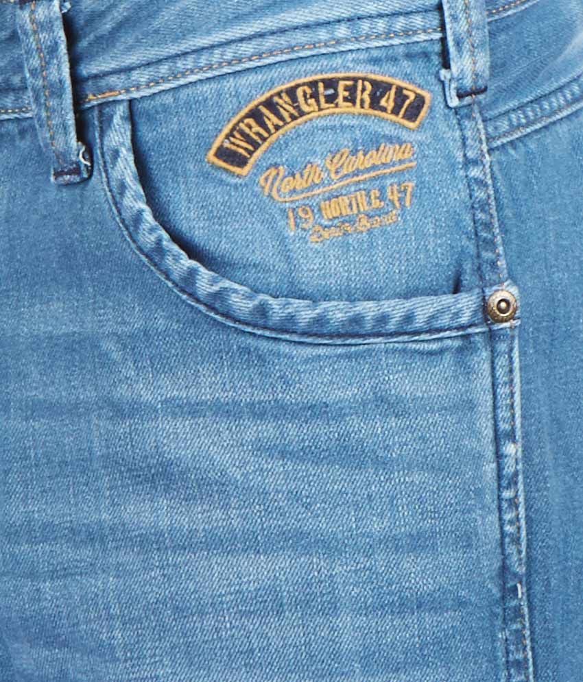 wrangler faded jeans