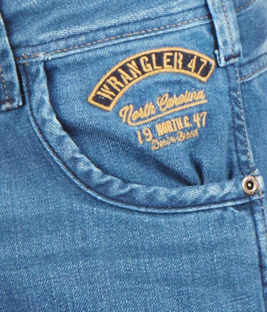 wrangler faded jeans