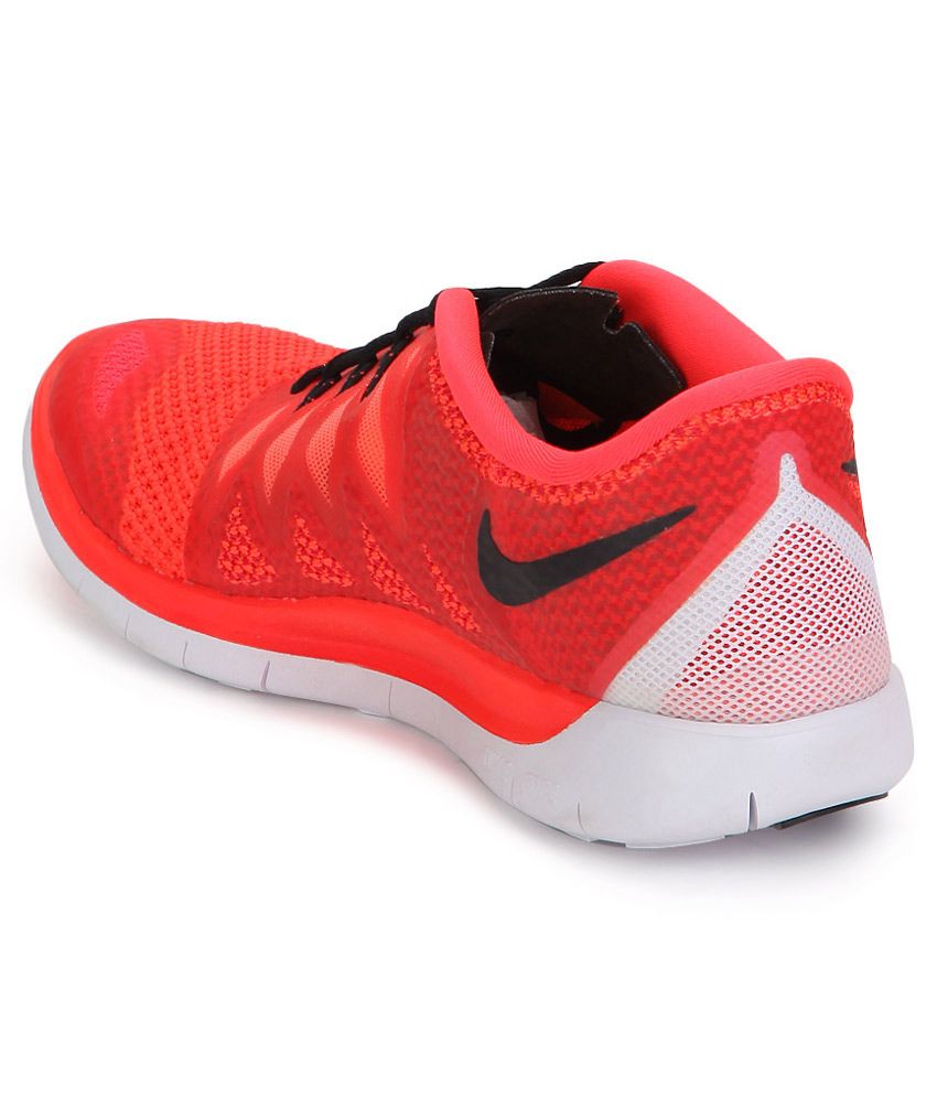 orange nike shoes kids