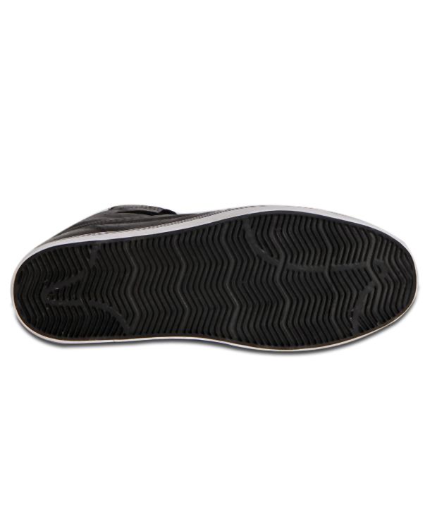 black ankle length sneakers