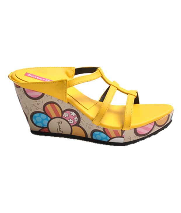 yellow heels with butterflies
