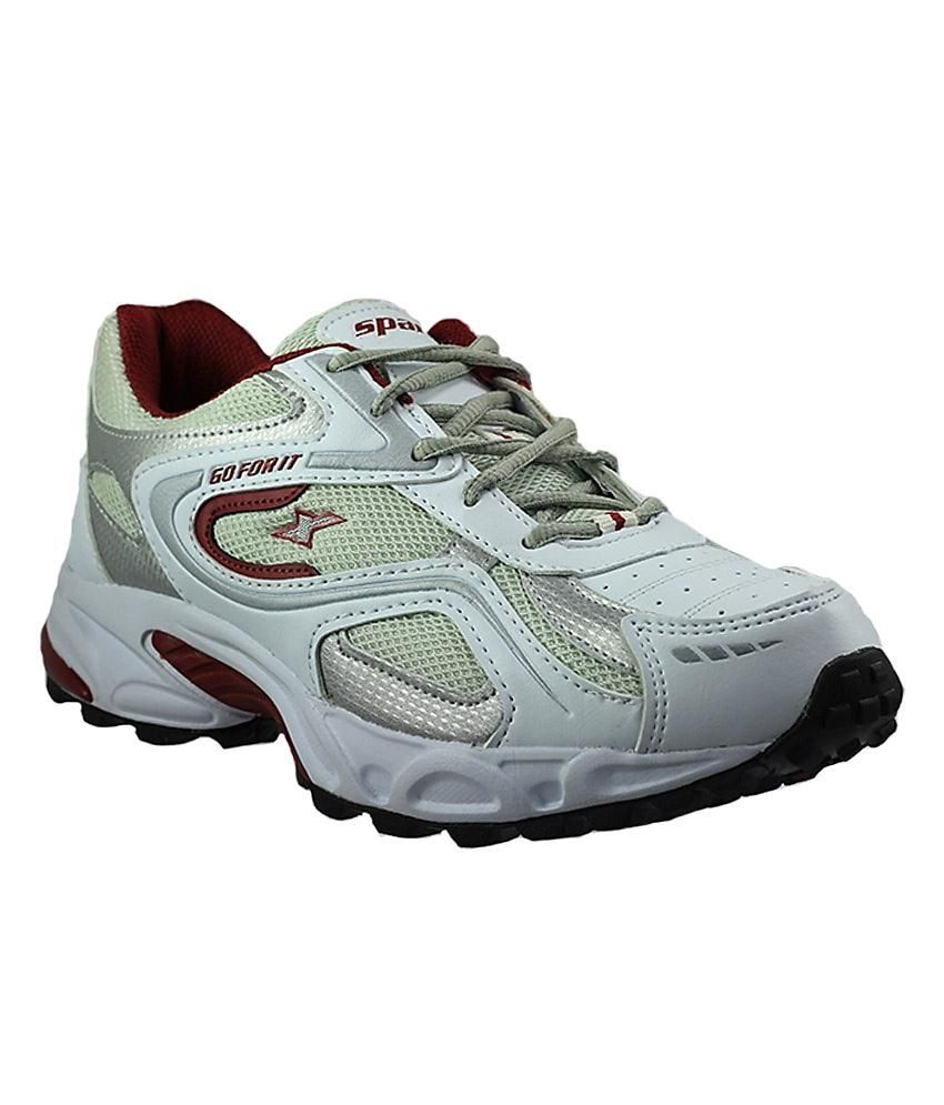 white and maroon sneakers