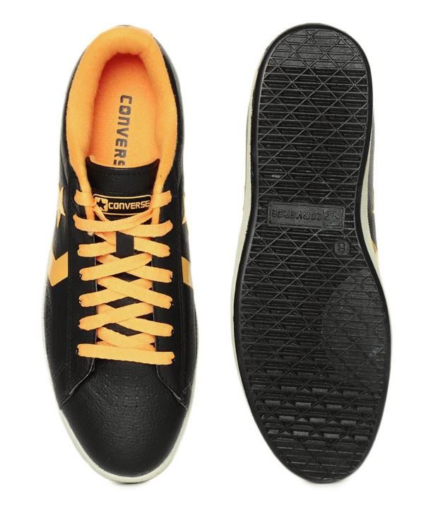 black and yellow leather converse