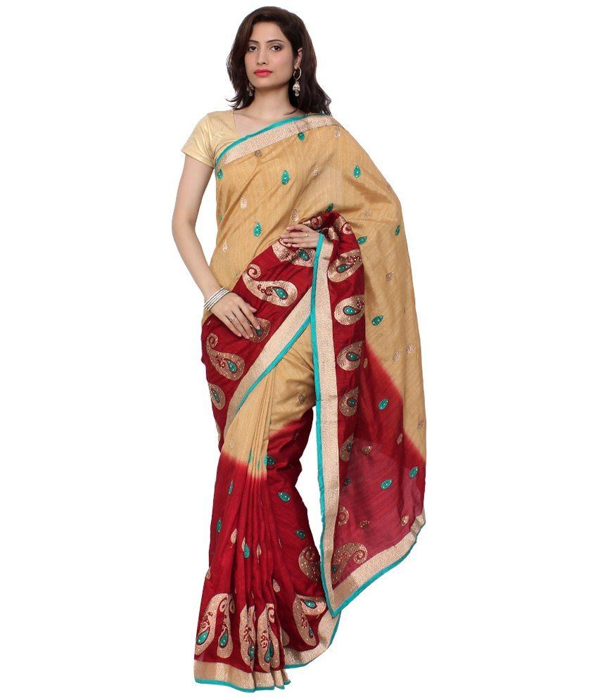 golden color saree with red blouse