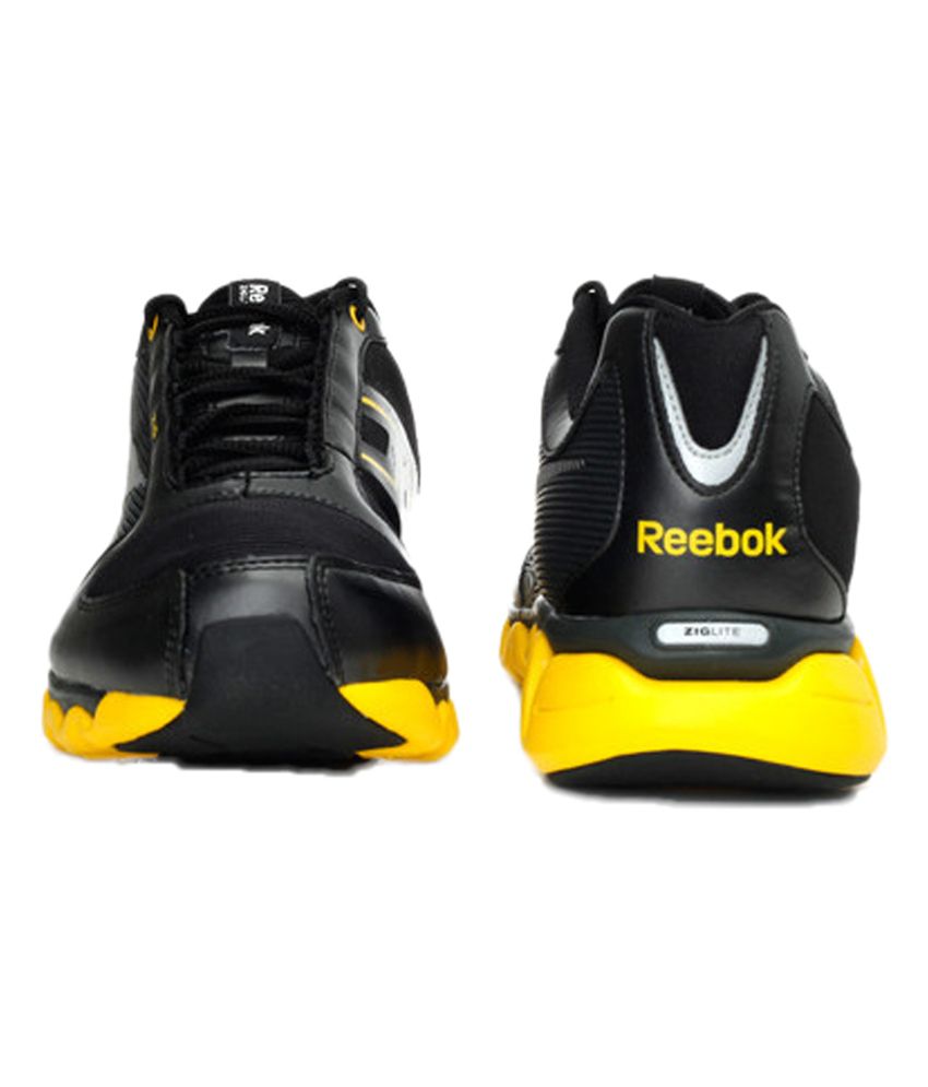 reebok black and yellow