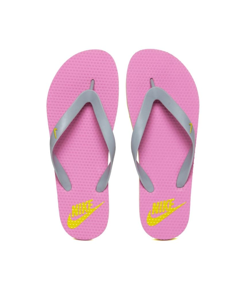 nike flip flops neon