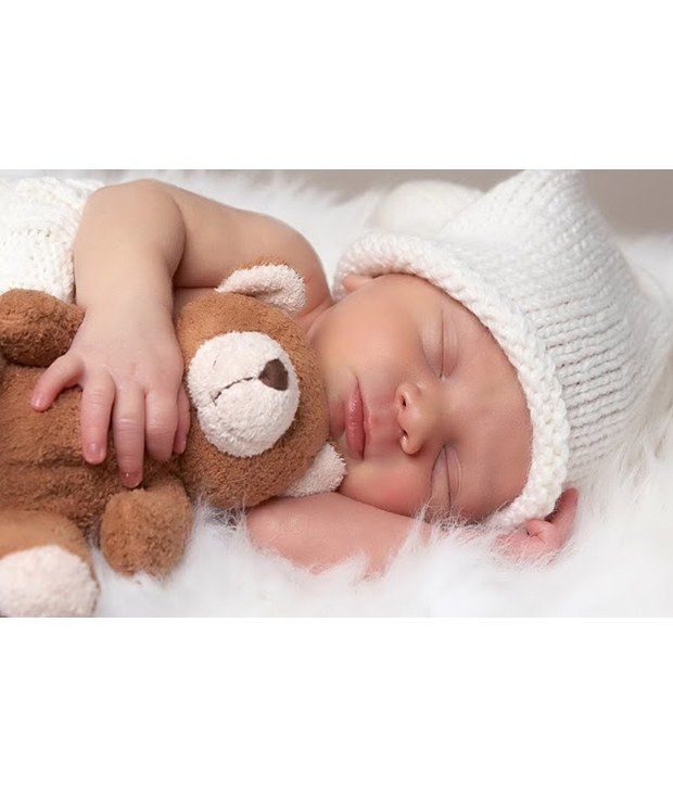 cute baby sleeping with teddy