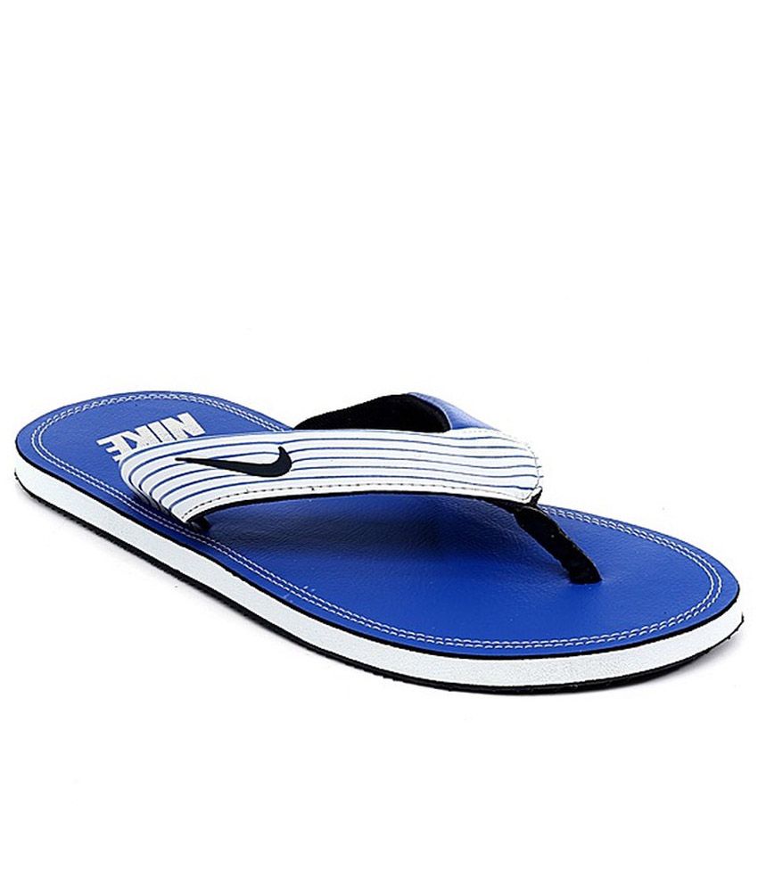 navy blue nike flip flops