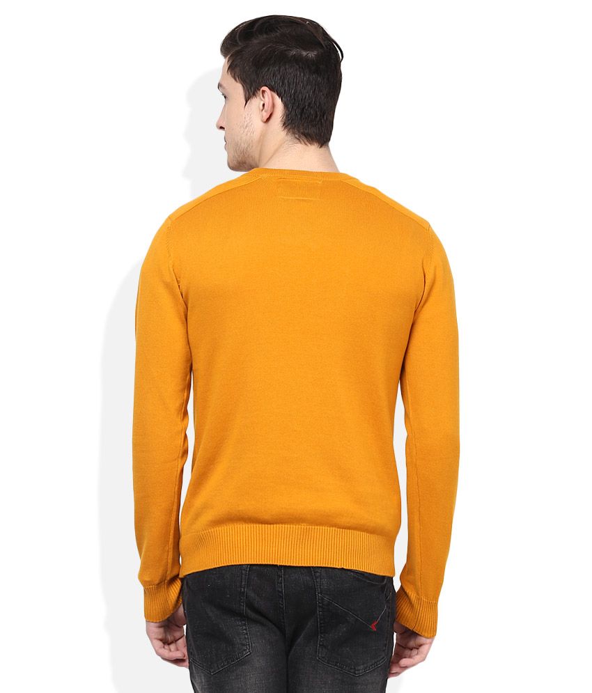 gold v neck sweater