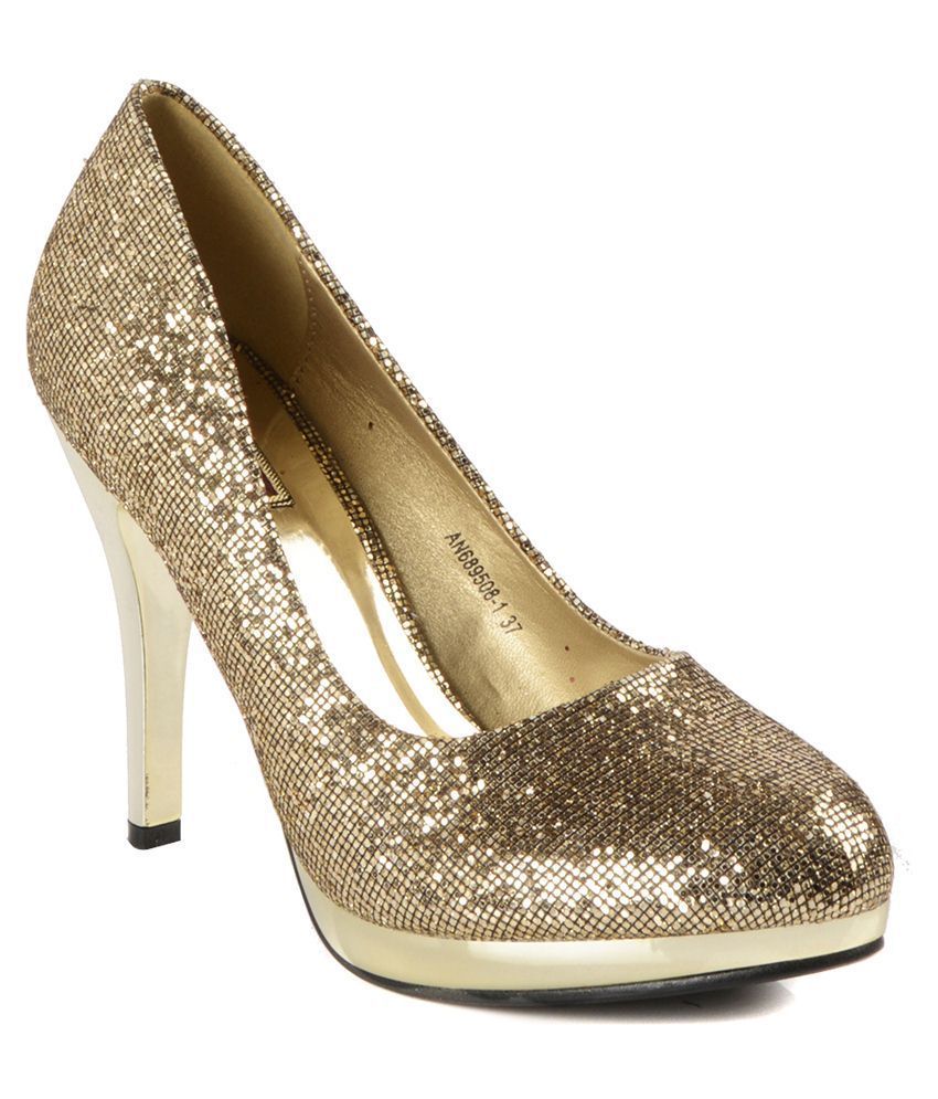 gold pumps flat