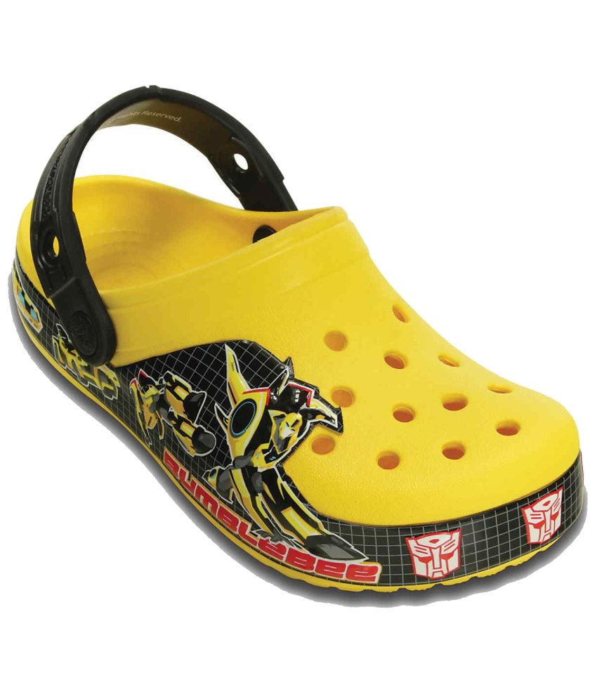 yellow crocs with flowers