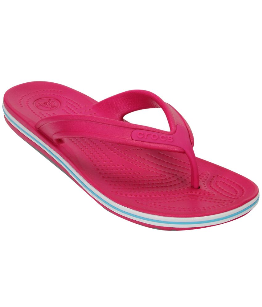 crocs pink flip flops