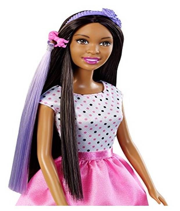 barbie doll with hair accessory