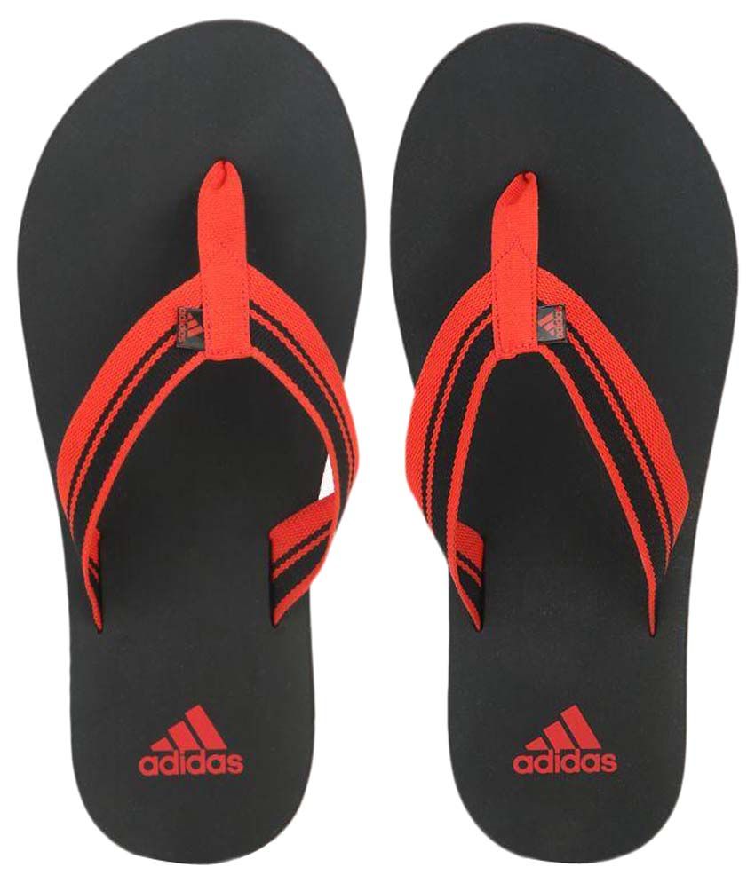 orange adidas flip flops