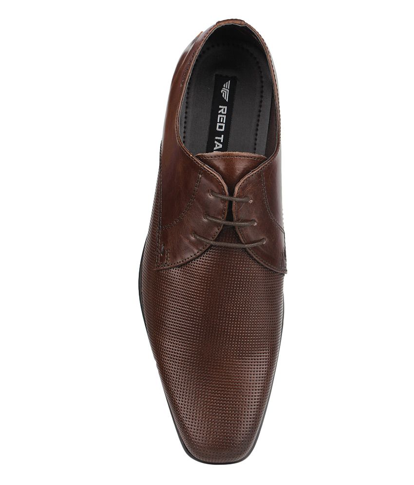 red tape tan derby shoes