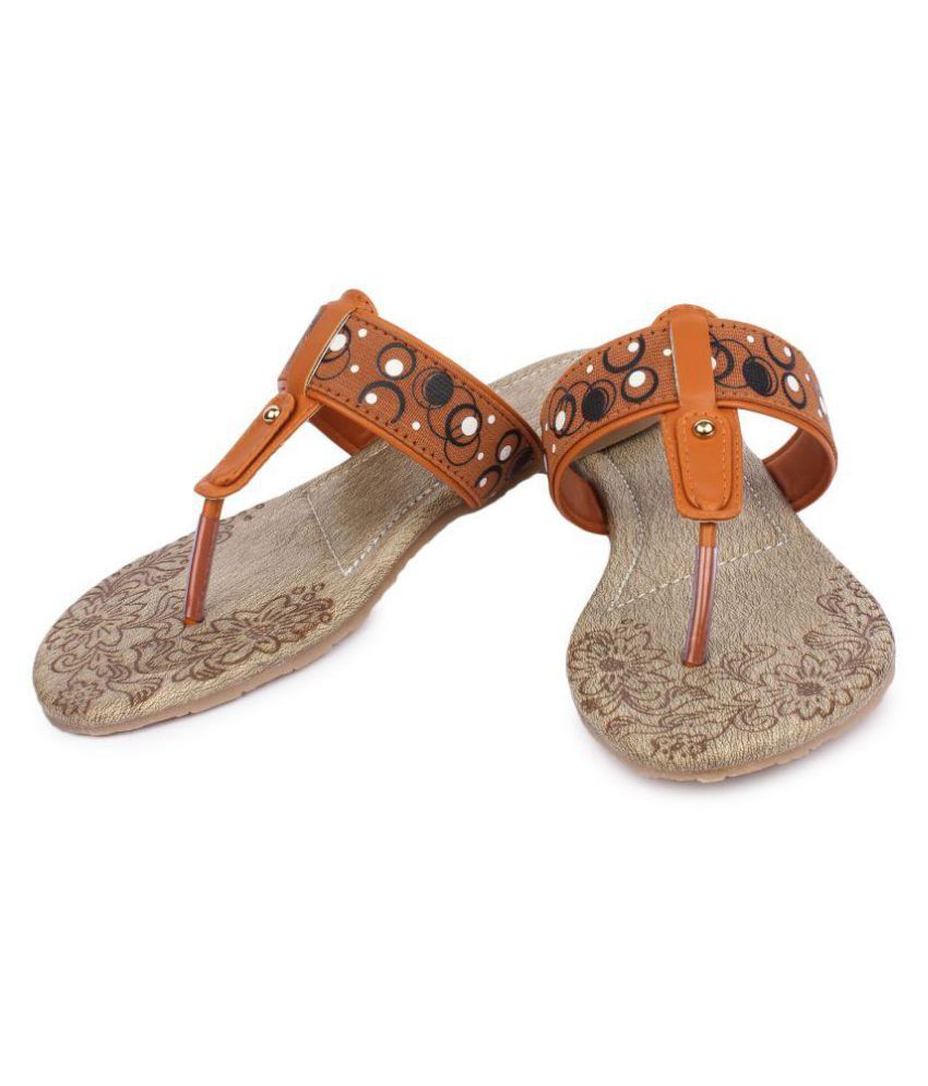 pointy tan flats