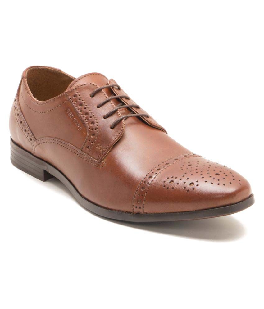 red tape tan shoes