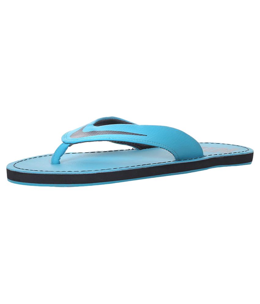 nike turquoise flip flops