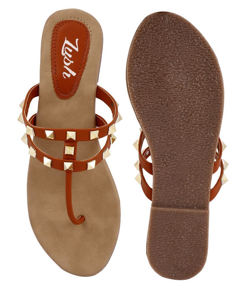 shiny tan flats