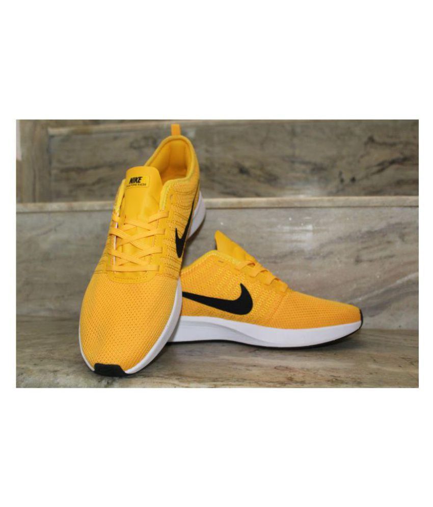 yellow running shoes nike