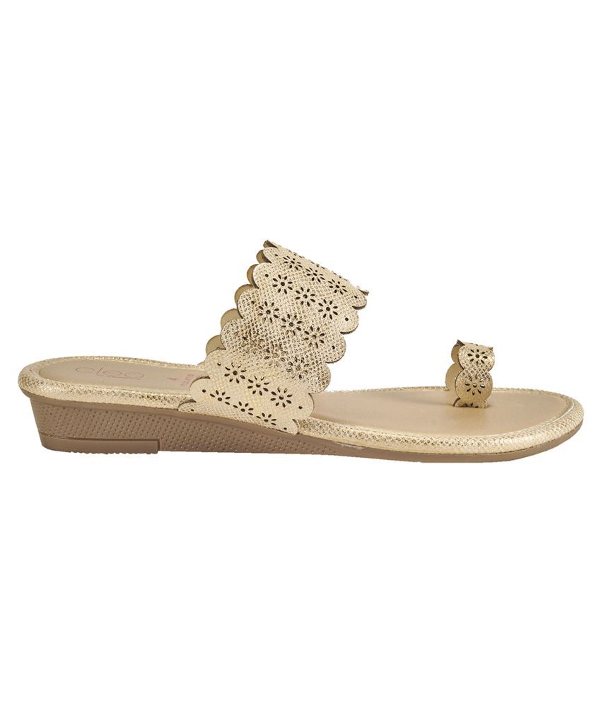 beige flats with black tips