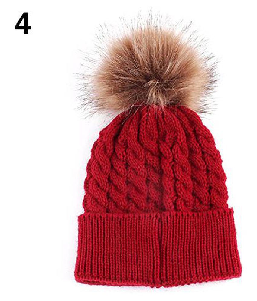 ball on top of winter hat