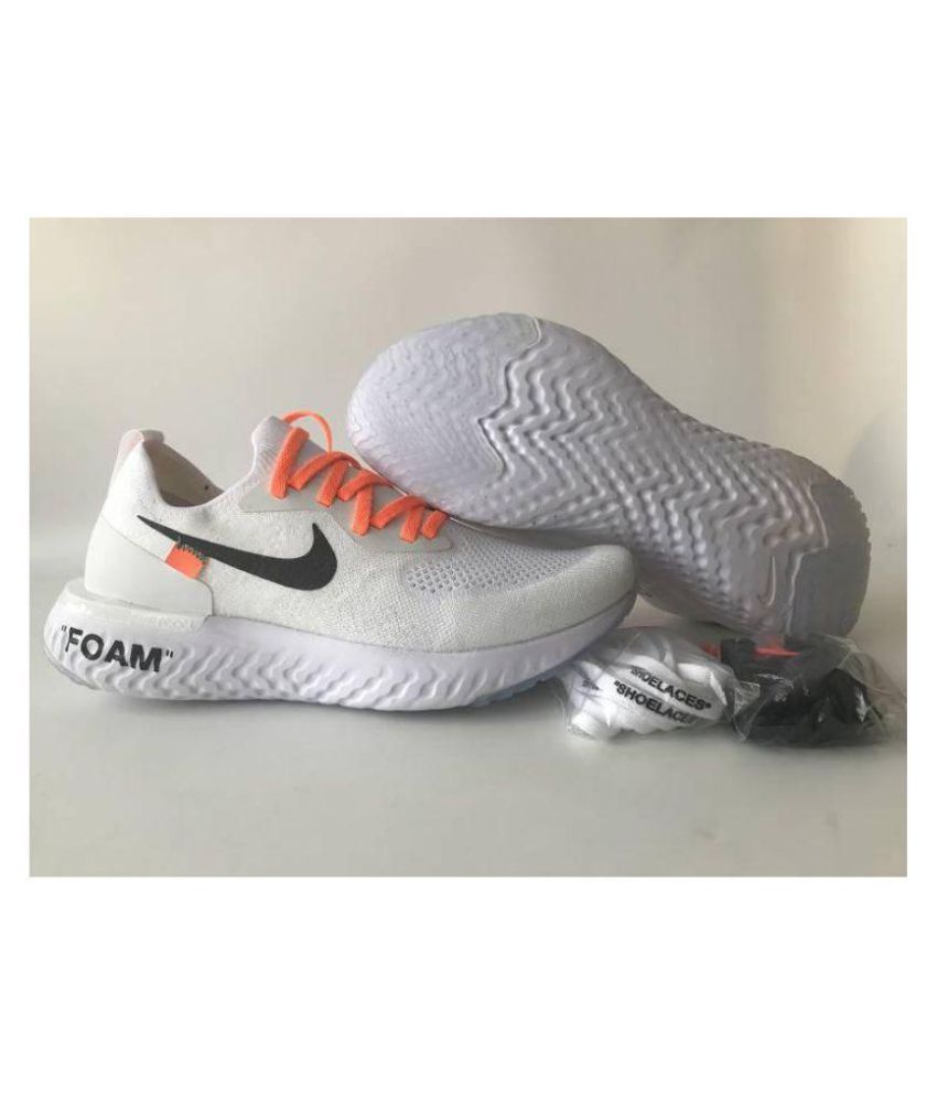 running white nike shoes