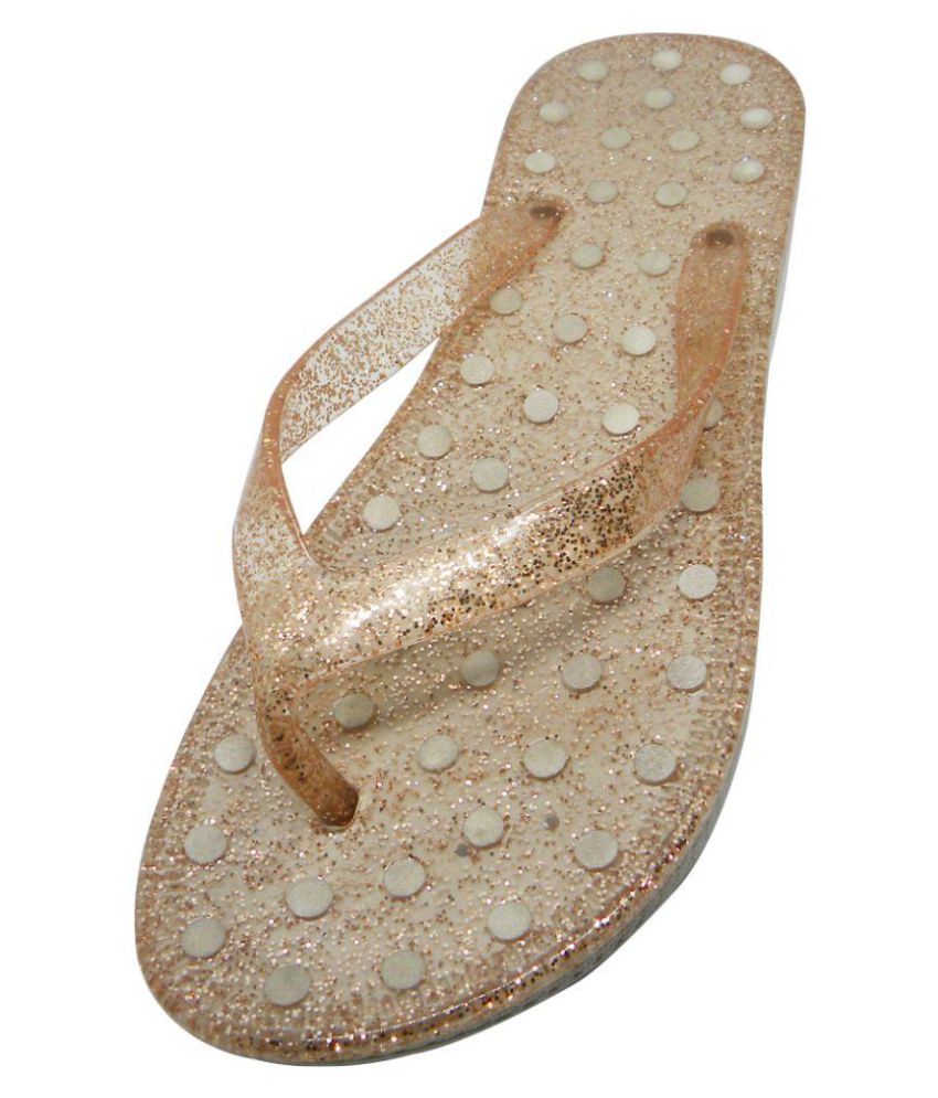 gold and white slippers