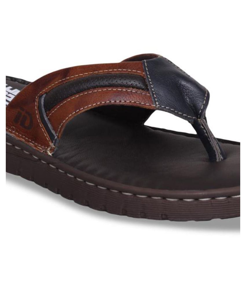 tan and black flip flops