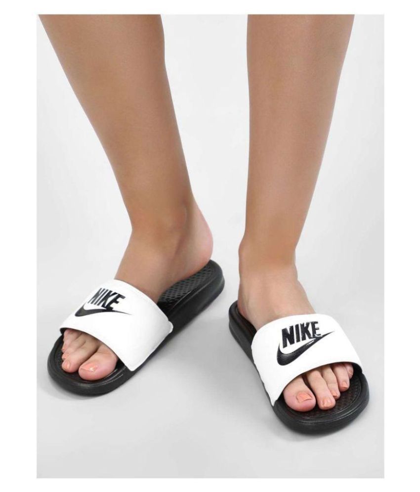 white nike flip flops