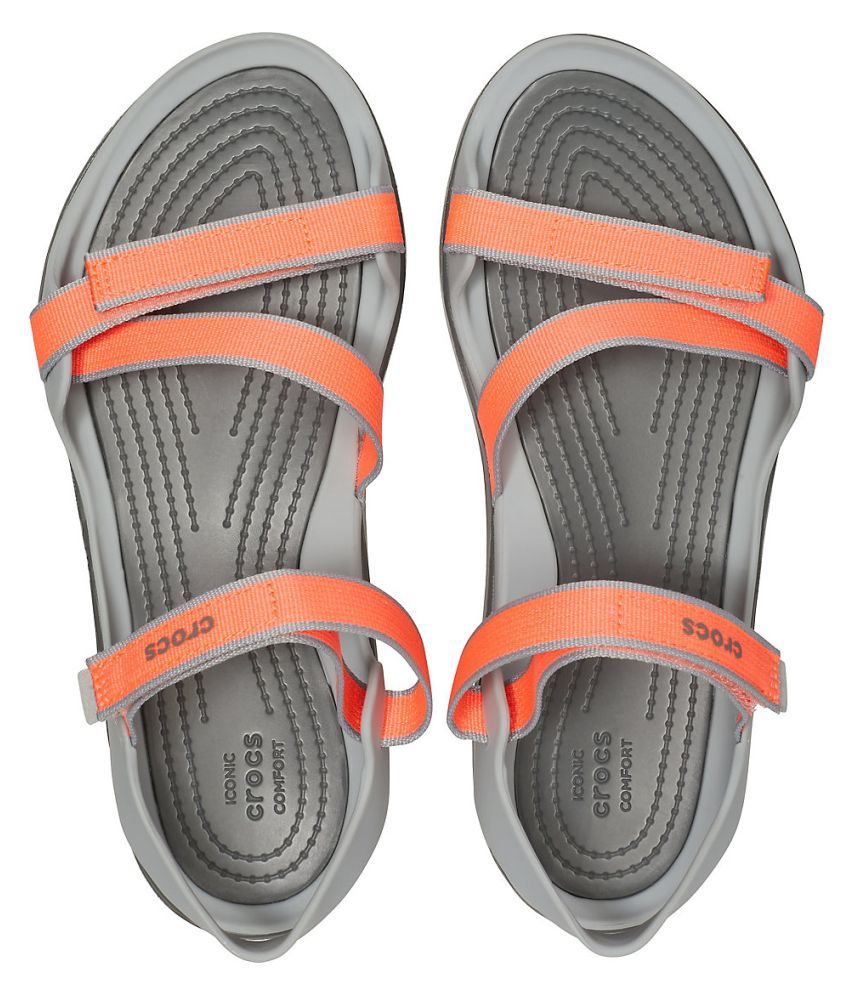 grey crocs with orange strap