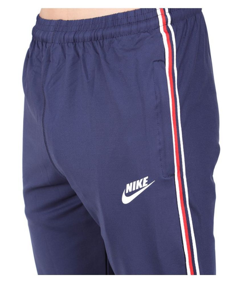 nike track pants red stripe