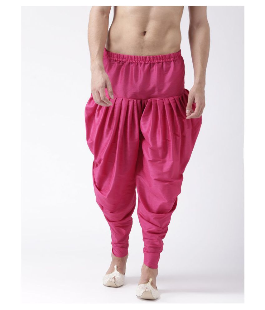 pink shirt and dhoti