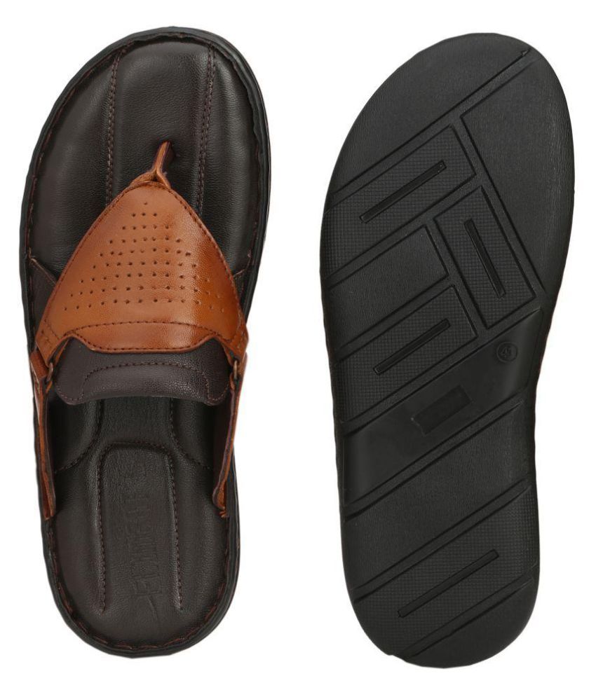 tan and black flip flops