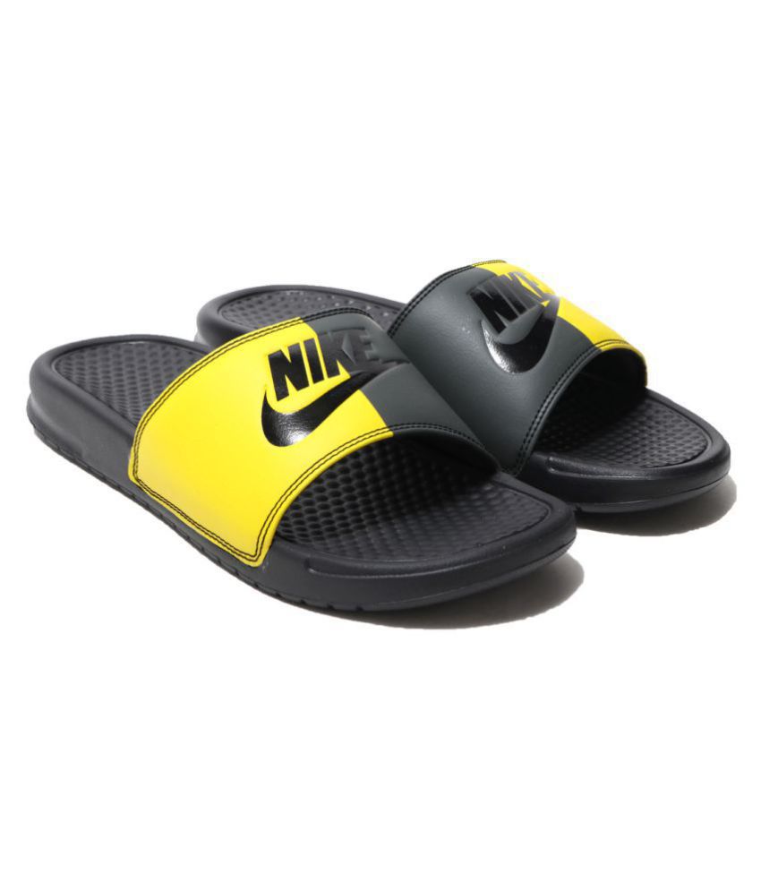 black and yellow nike slides