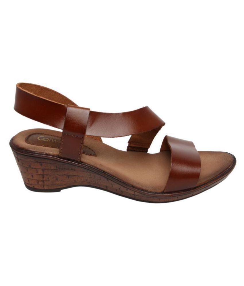 pointy tan flats