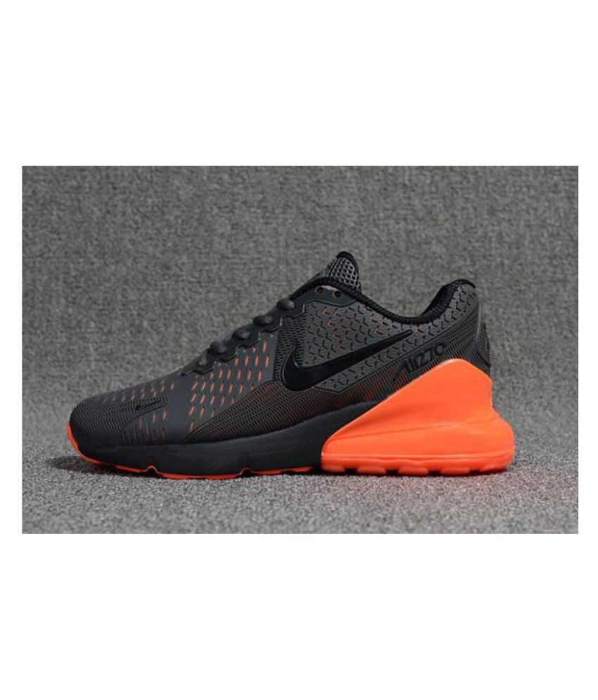 black and orange gym shoes