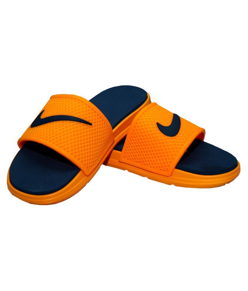 orange and blue nike slides