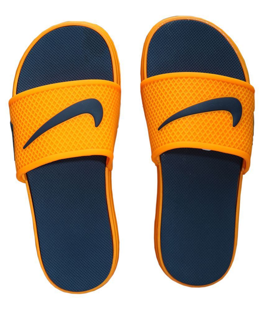 neon orange nike slides