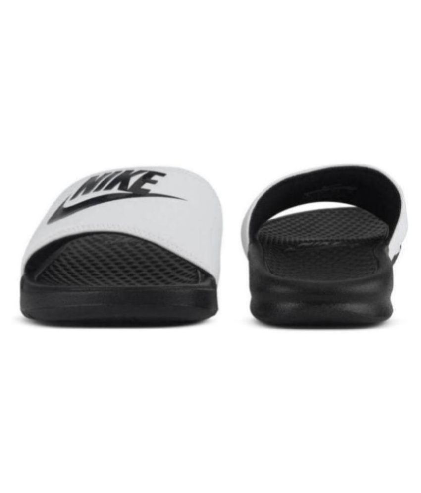 white nike flip flops