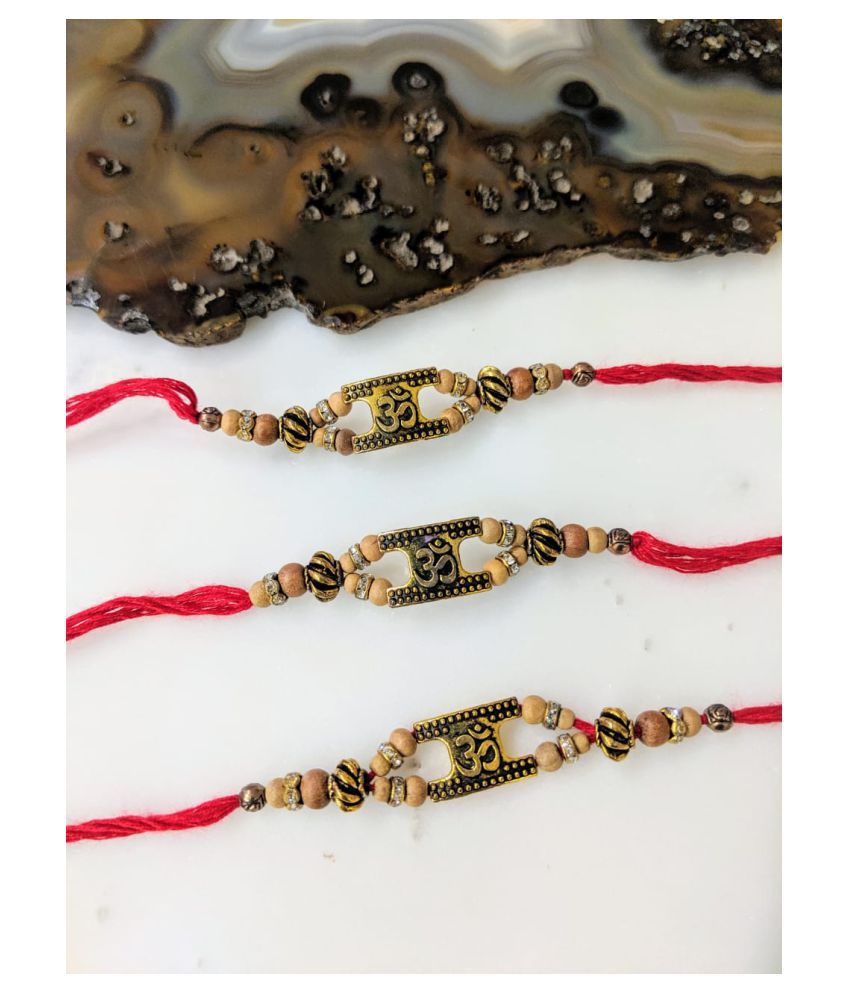     			OM Designer Rakhi Set For Men Gold Plated Wood Beads Multicolor Thread Designer Rakhi For Brother/ Bhaiya/ Bhabhi/ Bhai/ Bro (Pack of 3) Rakshabandan Colorful Rakhee Mauli Bracelet For Boys
