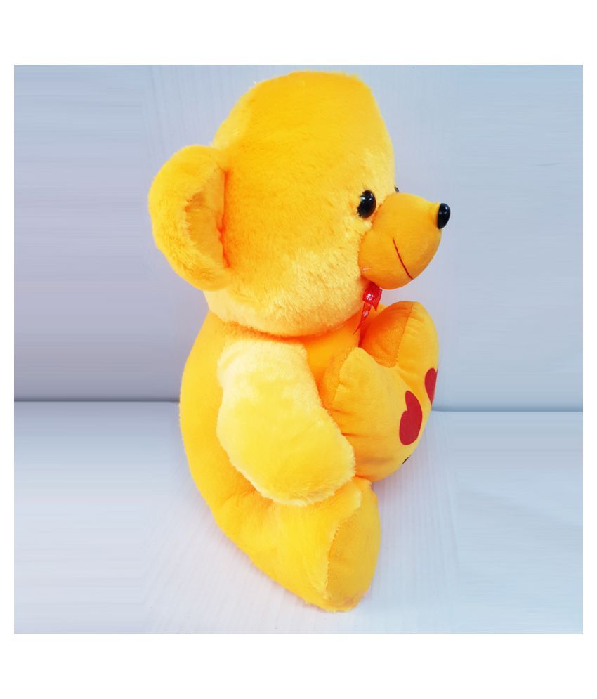 white and yellow teddy bear