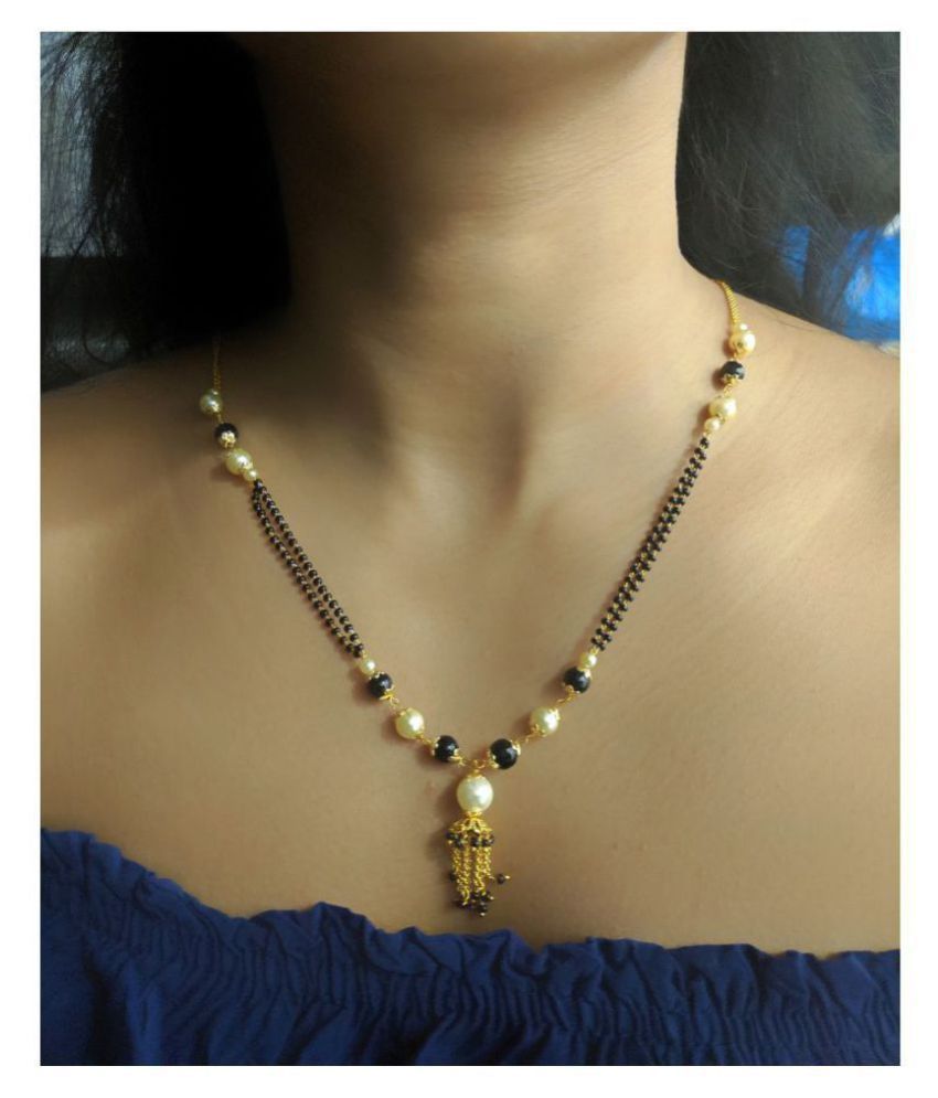 Digital Dress Room Gold Mangalsutra Design Latest Women S Pride Stone Studded Mangalsutra White Pearl Golden Latkan 18 Inch Length Black Beads Double Layer Single Line Chain Short Mangalsutra Designs Buy Digital Dress Room The patterns are with traditional and contemporary motifs for both traditional and modern wear. digital dress room gold mangalsutra design latest women s pride stone studded mangalsutra white pearl golden latkan 18 inch length black beads double