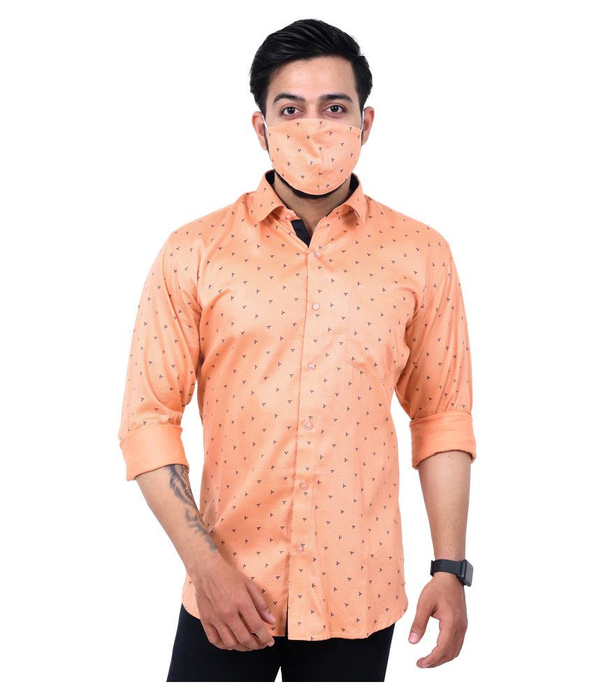 peach shirt and black pants