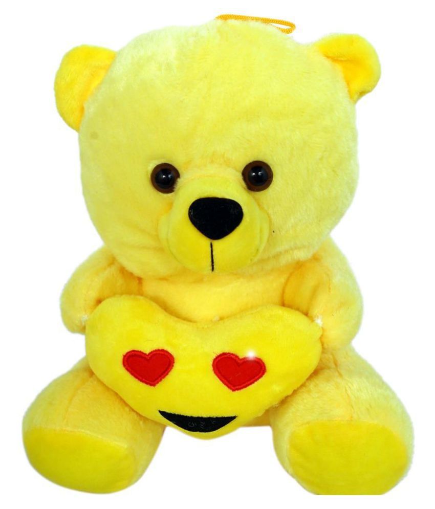 white and yellow teddy bear