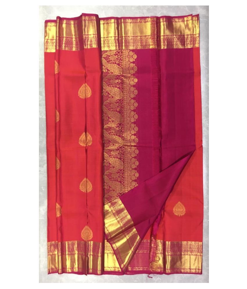 orange kanchipuram wedding saree