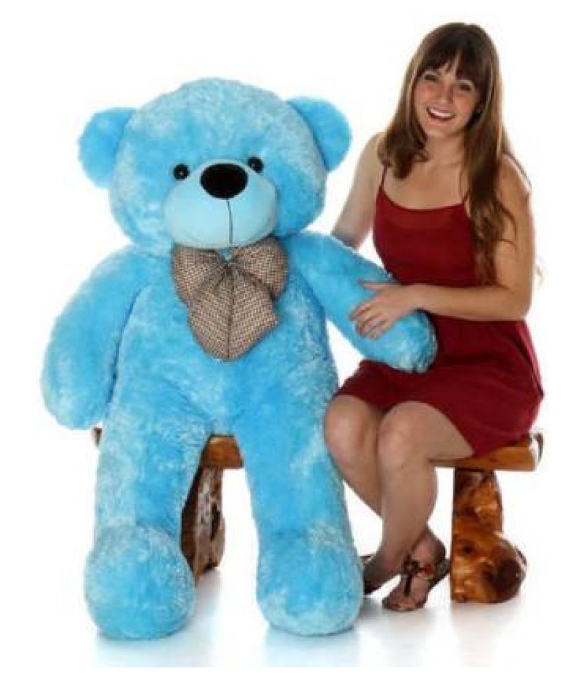 teddy bear with blue bow