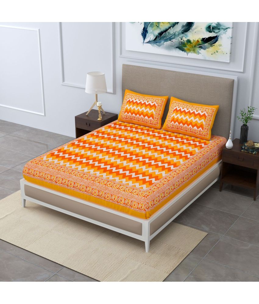     			Uniqchoice Cotton Abstract Double Bedsheet with 2 Pillow Covers - Yellow