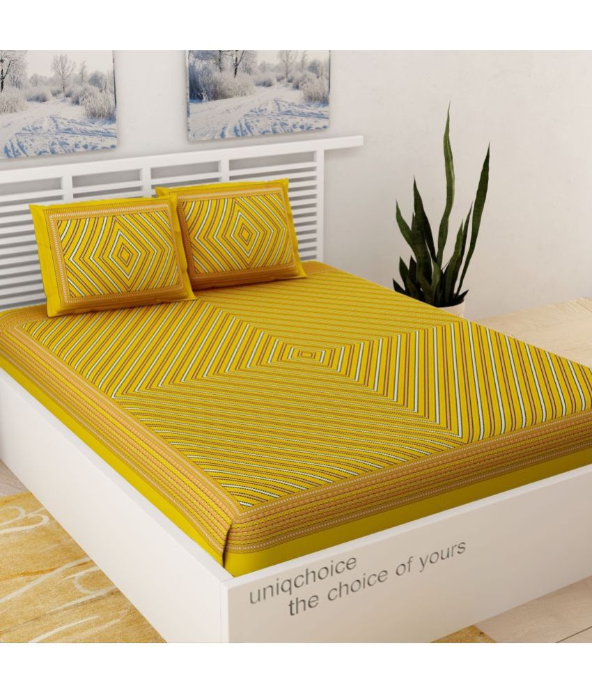     			Uniqchoice Cotton Abstract 1 Double Bedsheet with 2 Pillow Covers - Yellow