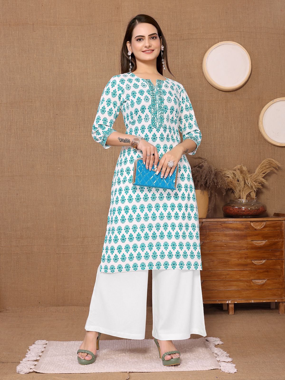     			Rangita Women Cotton Turquoise Embroidered Knee Length Straight Kurti
